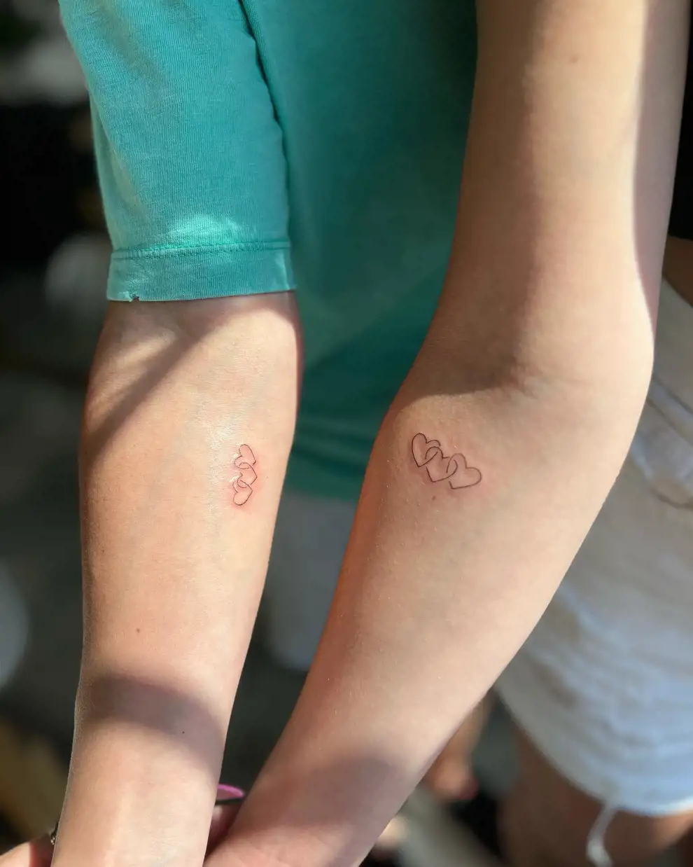 Tatuajes madre e hija: 3 corazones