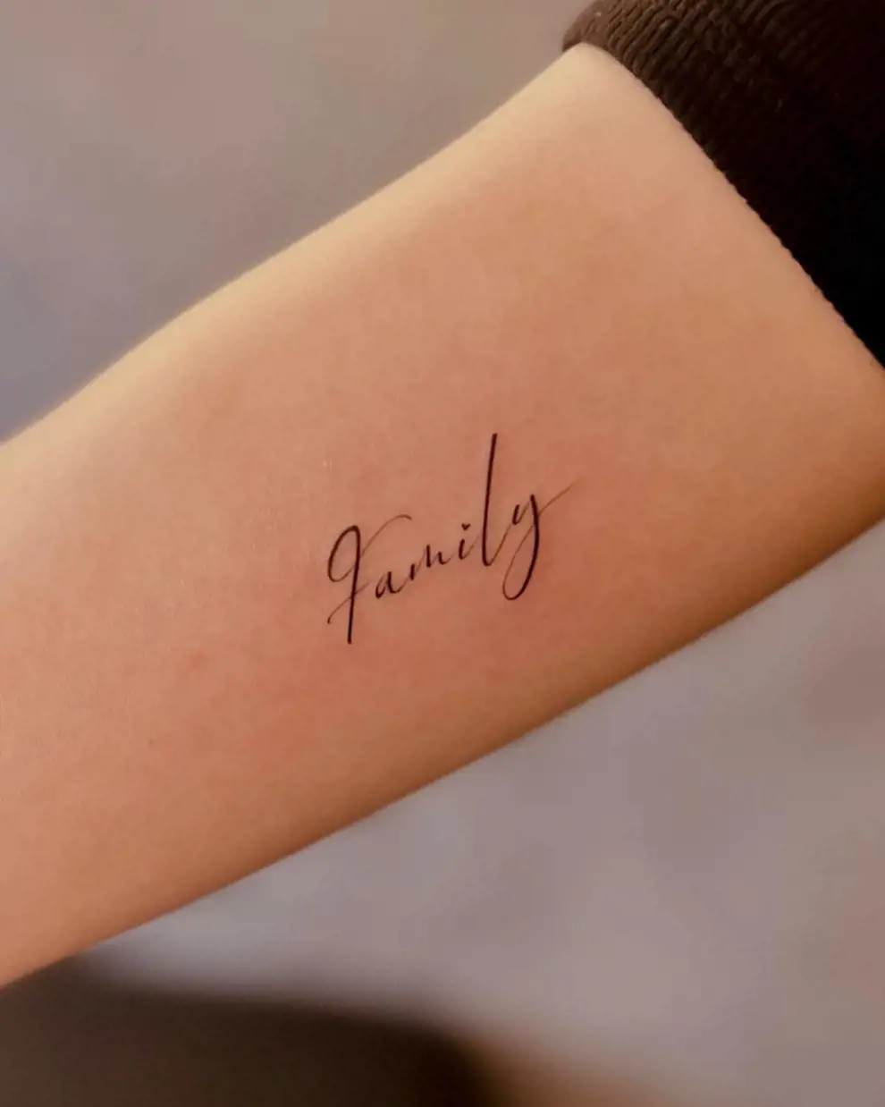 Pequeños tatuajes con palabras: family