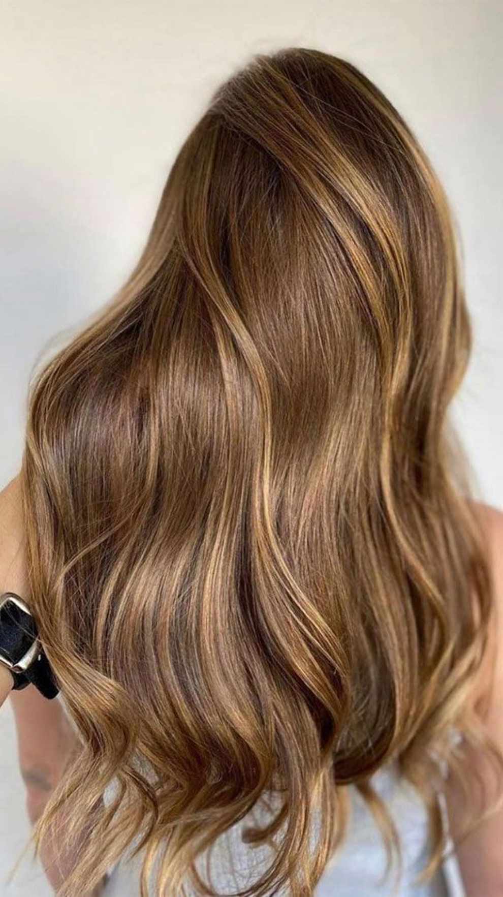 Balayage miel en cabello castaño 